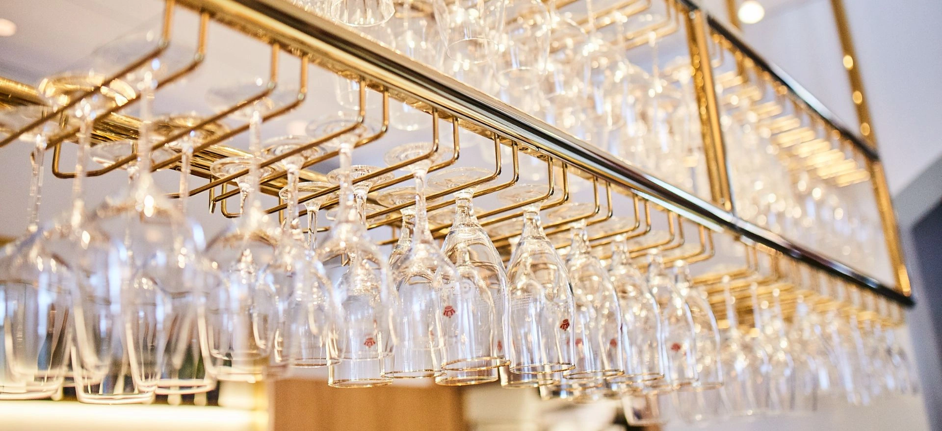 golden glas rack with glasses